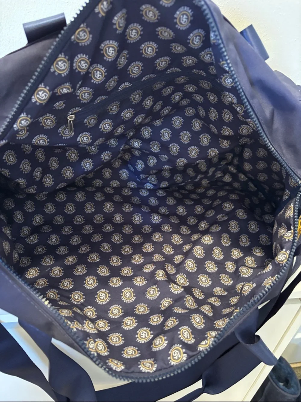 Limited 1912 Universal Studios Navy Duffel Bag with Yellow Logo Accent